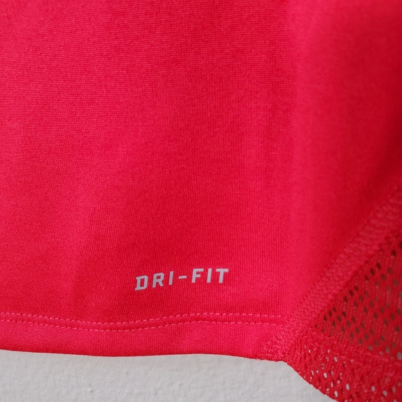 NIKE Dri-Fit Workout T with Mesh Paneling in Melon Red. - Picture 4 of 8